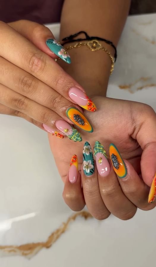 Nail art in blue and white with 3D flowers