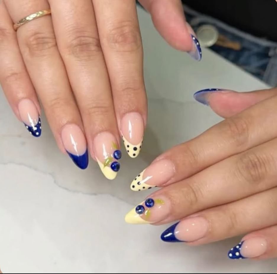 Navy and cream nail set with fine detail